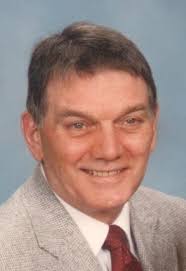 Justin E. Wolstenholm Obituary