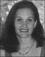 Deposits and symptomatology with soft contact lens wear