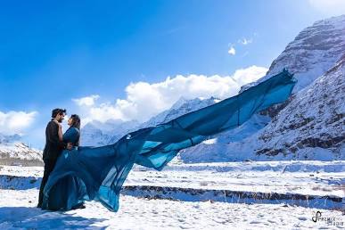 Snowy pre-wedding shoot framed by the Himalayas in Manali, AI generated