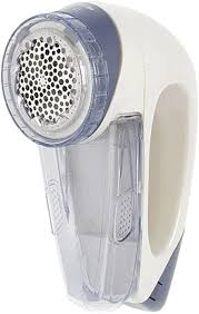 Remove bobbles on clothes by using sticky tape, a hair roller, a razor or a pilling comb. Fuzz Off Lint Remover Fluff Removing Machine Amazon Co Uk Home Kitchen