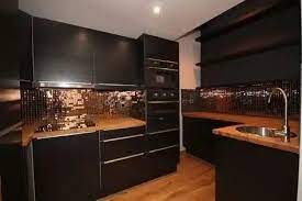 Black Cabinets With Copper Backsplash Copper Kitchen Black And Copper Kitchen Black Kitchens
