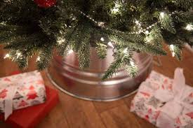 It also helps raise your christmas tree up off the floor. 6 Best Galvanized Tree Collars Plus Diy Option Sofestive Com
