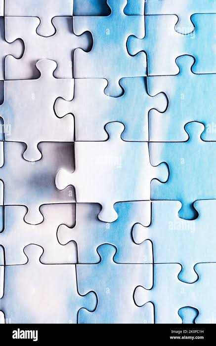 Puzzle. Piece of a puzzle with many pieces. The concept of a whole made up  of small parts Stock Photo - Alamy