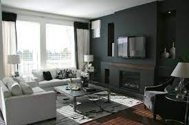Schwarze Wandfarbe Bringt Charme Und Dramatik Ins Innendesign Dunkle Wohnzimmer Wohnzimmer Grau Schwarze Wand