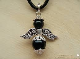 The angel of death in catholic and orthodox christianity, and in islam. Engel Amulett Azrael