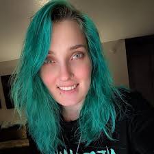 How to care for a ball python after cleaning its enclosure?