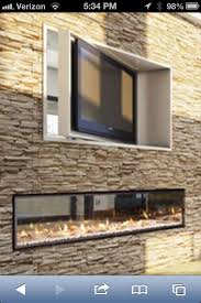 Yes Please Dual Fireplace With Rotating Television Unit Indoor Outdoor Fireplaces Double Sided Fireplace Fireplace Design