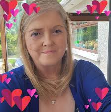 Sunbeams and a light path across Donegal Bay to figures