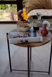 The guitar pick shaped table tops are mdf with a walnut oak veneer and paired with matte black metal legs. My Easy Ikea Hack With The Gladom Tray Table