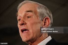 Allison Gibbs, an employee with the Ron Paul campaign, positions... News  Photo