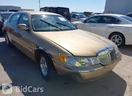 Image result for Light Parchment Gold 1999 Town Car