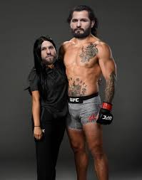 That's a pretty good height he has got. Keller Shares Image Of Jorge Masvidal And Coach After Mike Brown Is Out