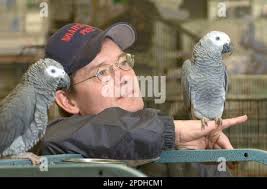 Tom Waters, owner of Noah's Ark Pets and Aquarium in Front Royal, Va.,  holds at his store