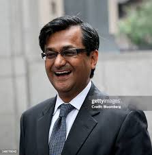 Anil Kumar, a former partner at McKinsey & Co., right, and his wife... News  Photo