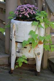 Pin By Carrie Hanson On Flowers Old Washing Machine Container Flowers Garden Containers