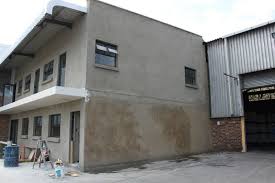 Plastering an external wall using sand and cement. The Ultimate Solution To A Flat And Smooth Finish On All Wall Surfaces Building Decor