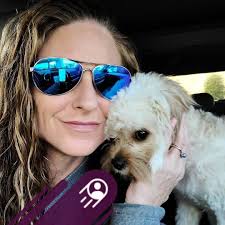 Boy with neon green hair singing with buddz