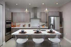 This Well Equipped Kitchen Offers A Stainless Steel Appliance Package With French Door Refrigerator A Sleek Ceramic Glas In 2020 New Condo New Home Communities Lennar