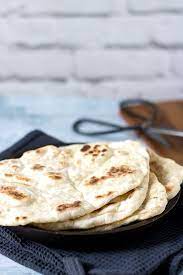 A Stack Of Light And Fluffy Quick And Easy Naan Bread Yeast Free Yeast Free Breads Recipes With Naan Bread Quick Naan Bread Recipe