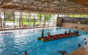 The transparent bottom pool suspended in the the five story einstein fitness park building in switzerland. Best Indoor Swimming Pools Near Zurich Swiss Family Fun