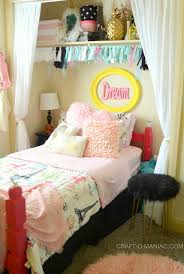 Corkboard hangs on the wall above the work area for a place to tack magazine clippings, fabrics, and sketches. 3 Do It Yourself Ideas To Add Crafts To The Bedroom 700 N Cottage