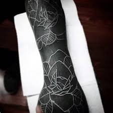 Explore line work to shading ink ideas with a subtle sense of style. Black Tattoo Sleeve With White Ink Tattoo