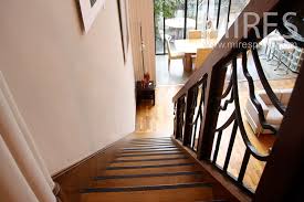 Dark handrails and light wood stairs. Beautiful Art Deco Wooden Staircase C1115 Mires Paris