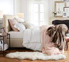 Lean back in comfort without worrying about leaving marks; Chesterfield Upholstered Bed With Footboard Pottery Barn
