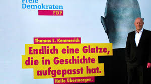 Designated new chairman of the german free democratic party (fdp) holds up a plate with sausages ahead of a party congress in duesseldorf late may 3, 2001. Landtagswahlen Fdp In Thuringen Wird Einen Optimistischen Wahlkampf Fuhren