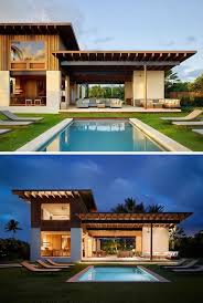 This Modern Beach House In Hawaii Has A Swimming Pool Surrounded By Grass And Sun Loungers Swimmin Modern Beach House Beach House Design Beach House Interior