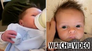 Jamie Redknapp kisses his son Raphael ahead of the newborn's first Christmas