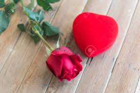 Download the perfect flowers pictures. Red Rose Flower Nature Beautiful Flowers From The Garden And Ring Red Box Heart Shape Design On Wooden Floor With Copy Space In Valentine S Day Wedding Or Romantic Love Concept Stock Photo