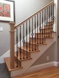 Assembly of a wood rail and iron baluster handrail. 962 Box Newel Plain Style 48 X 3 1 2 All Things Stairs