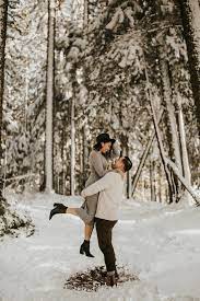Warm Winter Engagement Photo Outfit Ideas Junebug Weddings Winter Engagement Photos Outfits Winter Engagement Photos Engagement Photo Outfits