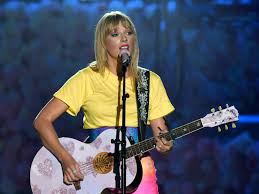 Taylor swift wears a striped sweater and sunglasses while heading into her hotel on monday afternoon. New Taylor Swift Album Lover To Drop In August Vox