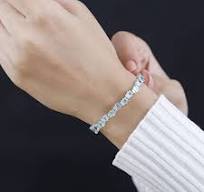 D'Joy Premium Paraiba Apatite and Moissanite Ocean Wave Bracelet in Rhodium  Over Sterling Silver (7.25 In) 12.25 ctw
