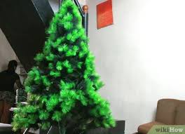 How to hang christmas tree lights outdoors. 4 Ways To String Christmas Tree Lights Wikihow