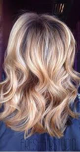 Honey brown hair can be elevated by styling it in different ways, toying with the length or even playing with colors. Mane Interest Dark Honey Highlights