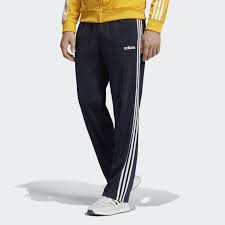 adidas essentials 3 stripes pants blue adidas us in 2021 striped pants mens mens activewear mens pants