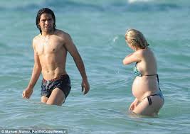In 2017 they added a son. Radamel Falcao Cradles His Pregnant Wife Lorelei Taron Baby S Bump As Pair Enjoy A Splash In The Sea Daily Mail Online