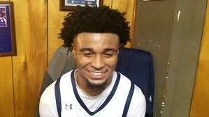 Grimsley Coach Darren Corbett and players Patrick Carter and Kaden Catoe  after big win over Page HS.