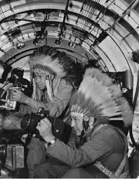 Gus Palmer (Side Gunner) and Horace Monroe Poolaw (Aerial Photographer)  inside a B-17 Flying Fortress at MacDill Field in Tampa, Florida during  World War II