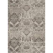 Made of polyester, this rug will give your feet a plush surface to relax on. Terrain Taupe Cream Aztec Pattern Indoor Outdoor Rug Overstock 31423181