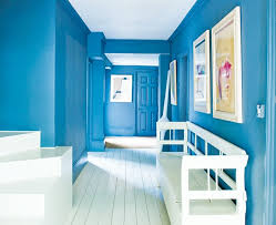 A navy blue hallway storage console that holds various books and photographs. Colors To Paint A Hallway 24 Ideas Useful Ideas