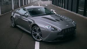 Image result for Titanium Silver 2010 Aston Martin