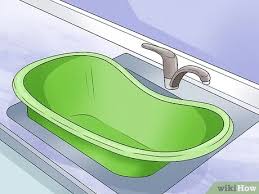 Bathing a baby for the first time is a big deal for most parents. 5 Ways To Bathe A Newborn Wikihow Mom