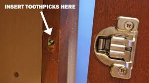 How to fix a hole in a cabinet door. Fix A Stripped Screw Hole With Toothpicks Stripped Screw Screw Door Stripping