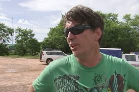 Men rescued from burning boat in crocodile-infested waters in Darwin