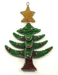 African american christmas decoration not only celebrates authentic african traditions, but also the styles and contributions but what i am saying is that that same tree will look all that much better with african american christmas decoration strung up alongside the more traditional christmas decor. Beaded Christmas Tree Ornament African Christmas Christmas Ornament Crafts Traditional Christmas Ornaments