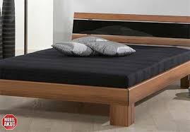 Nussbaum massiv;kopfteilkissen leder schwarz;liegefläche 180 x 200 cm;ohne lattenrost und matratzen;bht, ca. Bett Nussbaum Schwarz In 70182 Stuttgart For 100 00 For Sale Shpock